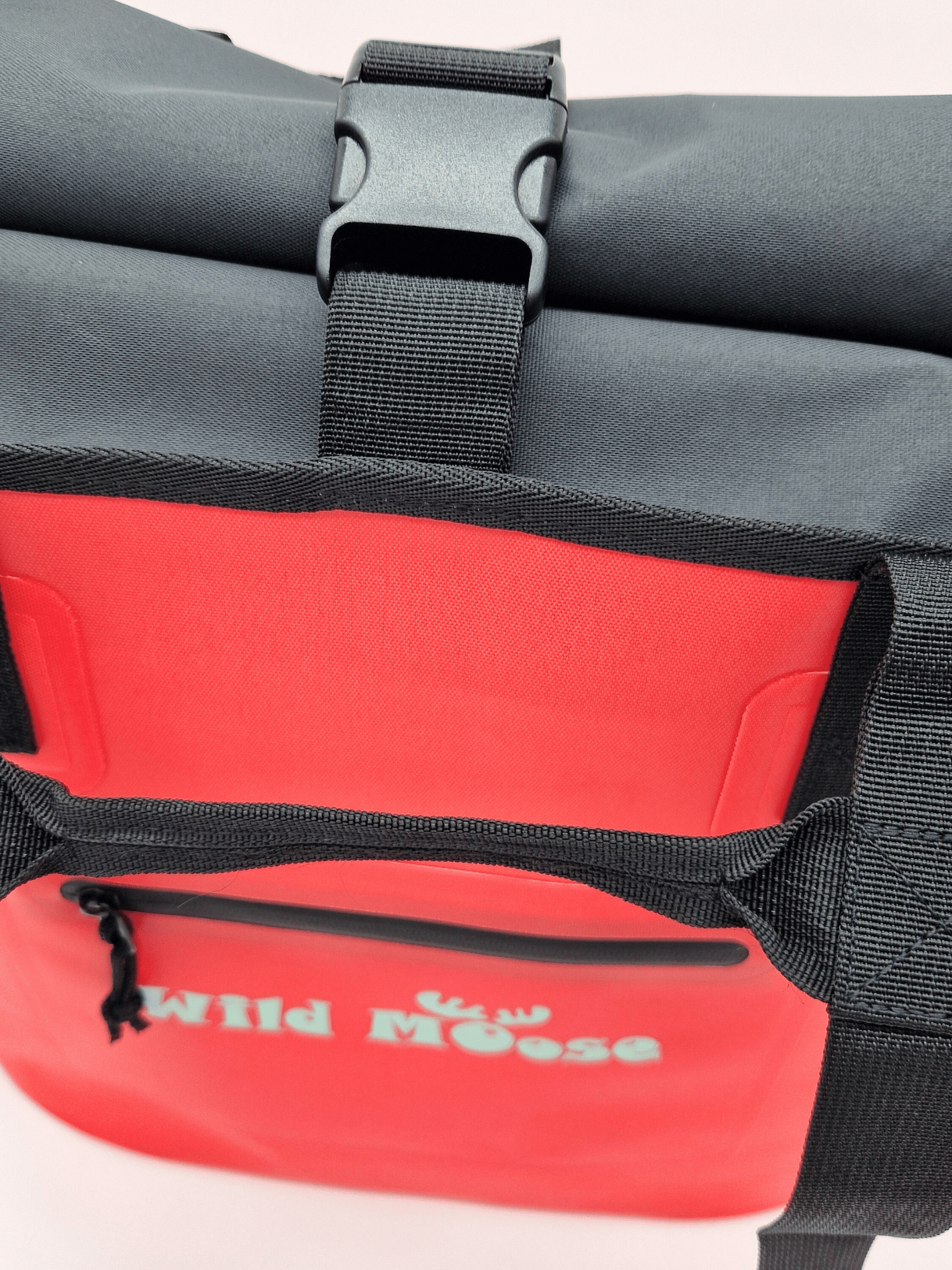 close up product shot of a coral coloured Wild Moose tote bag